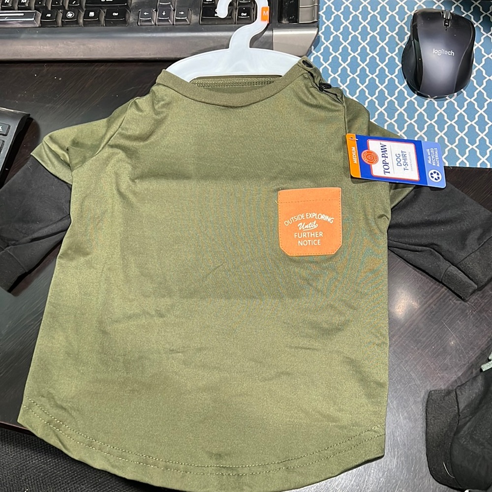 Green shirt with pocket and black sleeves